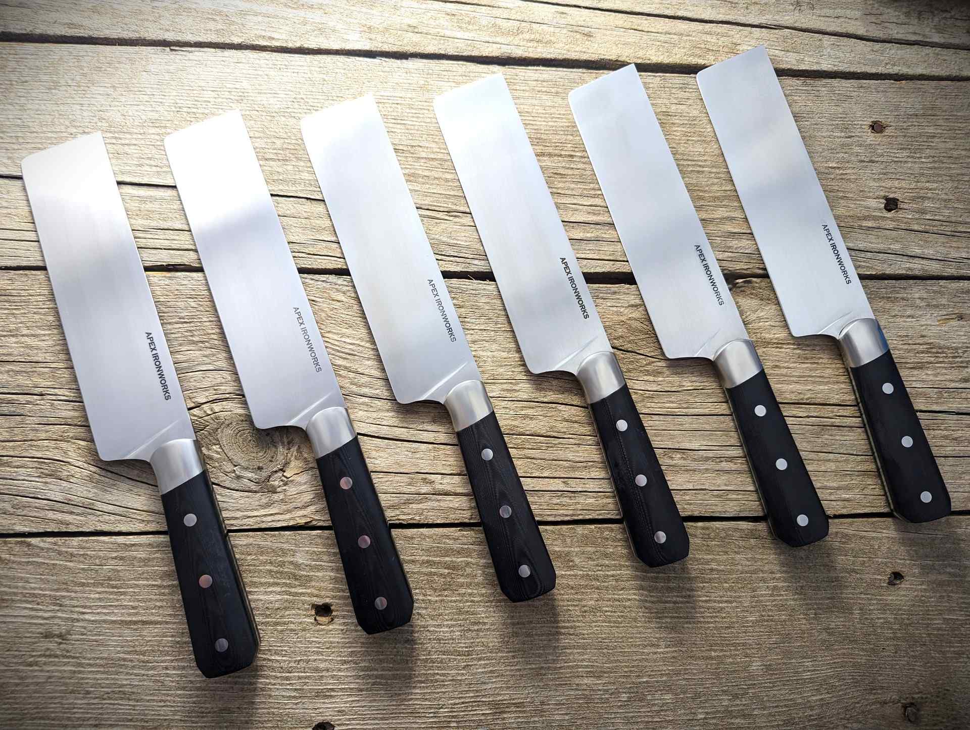 Batch of 6 Apex Steel Works S35VN Nakiri Chef's Knives with black linen micarta handle scales and stainless bolsters otherwise known as a nakiri knife